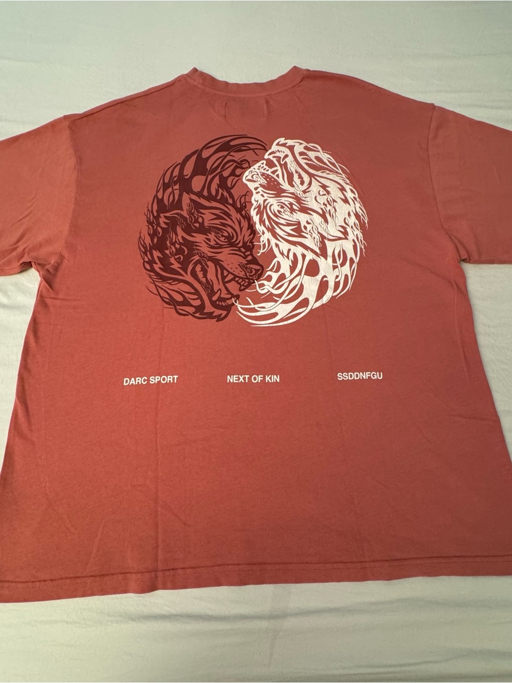 DARC Sport Wolves Club Next of Kin SSDDNFGU T-Shirt Size 2XL Color is Coral